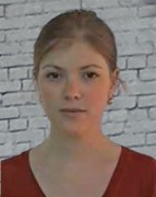 Zoe Chase Blonde woman with her hair pulled back